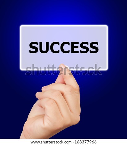 man hand touching button success keyword, on blue background. 
