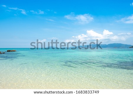 Beautiful blue Ocean landscape with beautiful beach and clear blue sky background in summer 