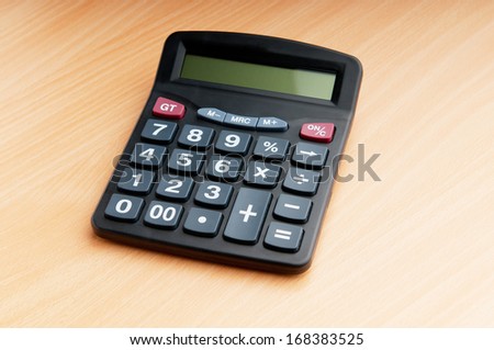 Business concept with accounting calculator 