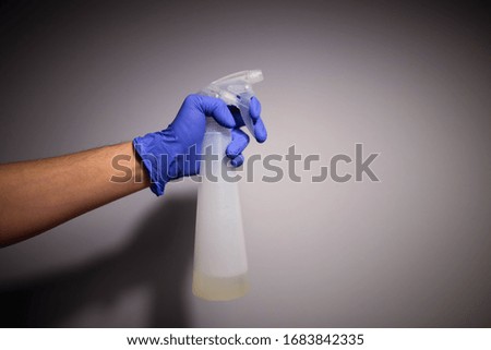 cleaning table with soap hands and spray