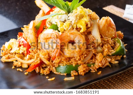 A view of a shrimp fried rice. Royalty-Free Stock Photo #1683851191
