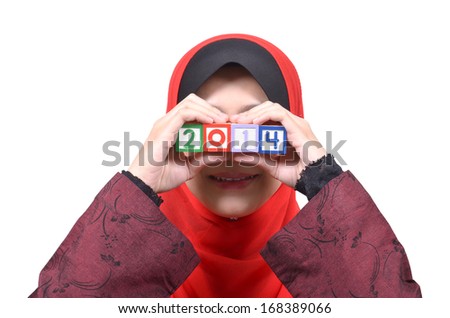 Beautiful young Asian muslim woman happy celebrate New Year 2014 isolated on white background 