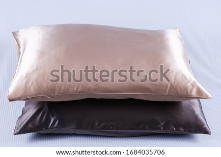 silk fabric, products. pillows, pillowcases, bedspread Royalty-Free Stock Photo #1684035706