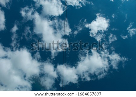 Image of blue sky with white clouds