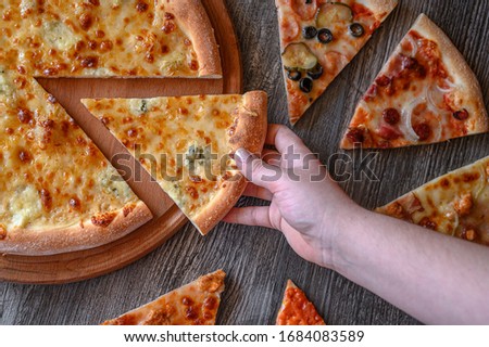 pieces of pizza on the table