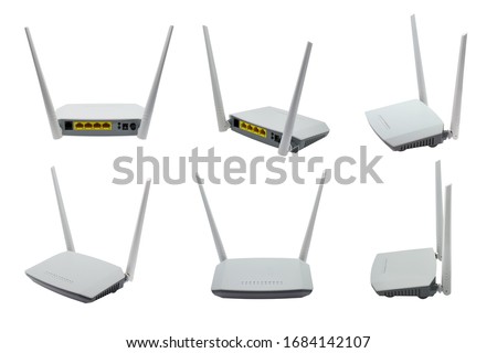 Wireless ADSL router and modem, wifi router and switch, combined device for modulation and demodulation. Network ports LAN and DSL. Isolated, white background. Royalty-Free Stock Photo #1684142107