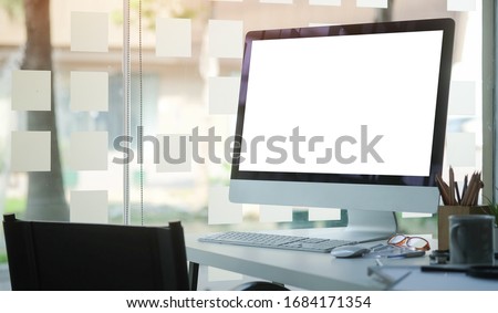 Office desk Workspace stuff with notepad, laptop and coffee cup mouse notepad shot. Royalty-Free Stock Photo #1684171354