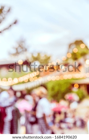 Vintage tone abstract blurred image Street  day market in garden with bokeh  for background usage.