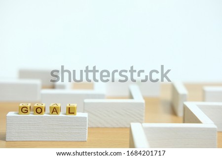 Business strategy conceptual photo – wooden beads word Plan above labyrinth maze