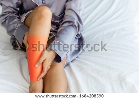 Calf pain or shin pain in the morning after a strenuous exercise from last night Royalty-Free Stock Photo #1684208590