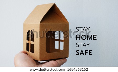 Stay Home to reduce risk of infection and spreading the virus. Save planet from Corona-19. Stay safe, stay inside home. Royalty-Free Stock Photo #1684268152