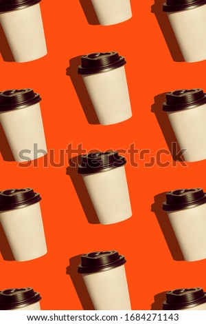 Coffee to go regular pattern made of photo on a lush lava background. Kraft paper cups with black lids and natural bright sun shadows. Lifestyle take away hot drinks concept. Trendy flatlay, top view. Royalty-Free Stock Photo #1684271143