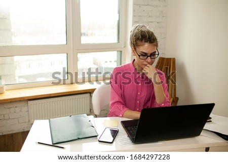 Young Woman Doing Office Work At Home