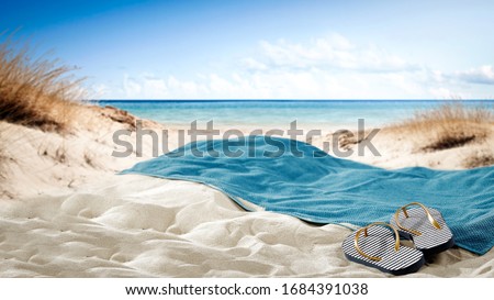 Summer beach and towel of free space  Royalty-Free Stock Photo #1684391038