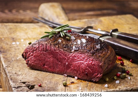 venison steak Royalty-Free Stock Photo #168439256