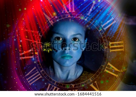 Art portrait of a child on a background of space and a clock, indigo
