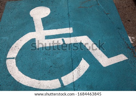 handicapped symbol for reserved parking place