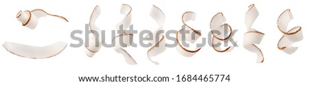 Coconut spiral curl slices set isolated on white background Royalty-Free Stock Photo #1684465774