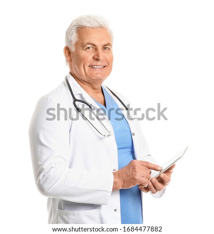 Portrait of male doctor with tablet computer on white background