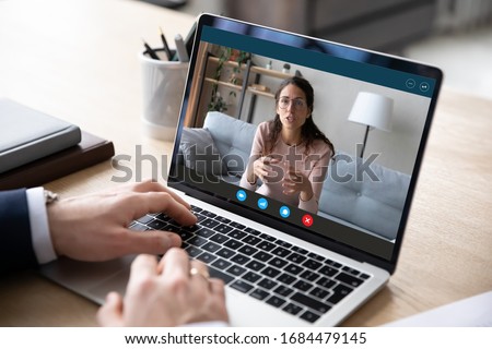 Screen computer view focused confident woman holding business negotiations video call from home, discussing partnership conditions online, consulting client remotely or giving educational lecture. Royalty-Free Stock Photo #1684479145
