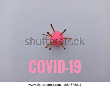 COVID-19 inscription with a white background. The WHO health organization introduces an official name for coronavirus called COVID-19.

