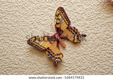 
butterfly figures on a mared