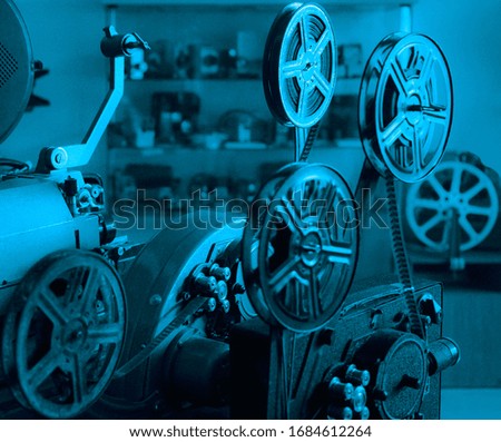 Old style movie projector, still-life. retro vintage tape video camera. antique film projector