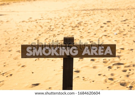 A no-smoking sign at a beach resort