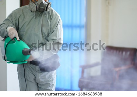 Disinfectant sprayers and germs that adhere on objects on the surface. prevent infection Covid 19 viruses or coronavirus And various pathogens. concept healthcare system ,stay safe and hand sanitizer. Royalty-Free Stock Photo #1684668988