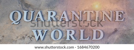 world quarantine  , writen wooden letters on stone background.  world quarantine   concep image.