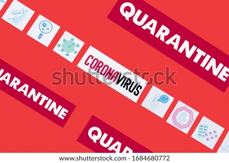top view of quarantine and coronavirus lettering near drawn medical pictures isolated on red