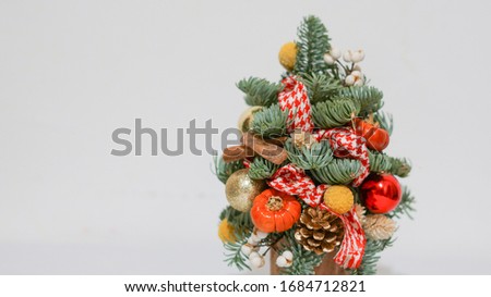 mini christmas tree with decorations, made from mini pumpkin, christmas ornaments and others dried flower.