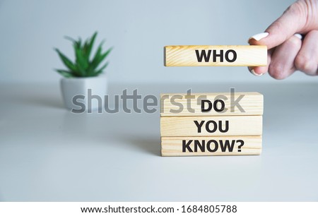 Who Do You Know text on wooden cubes, business concept. Royalty-Free Stock Photo #1684805788