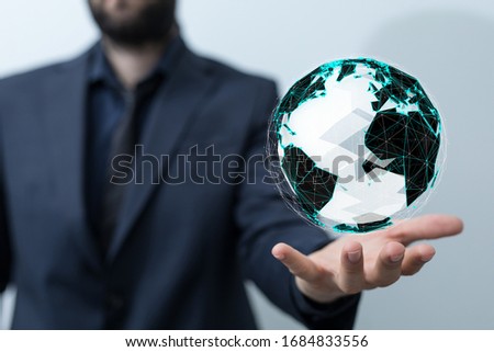 the world digital in hand
