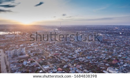 
Evening city at sunset, photo from a drone