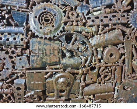 Industrial gear group texture also useful as background or pattern in blue and brown tones.