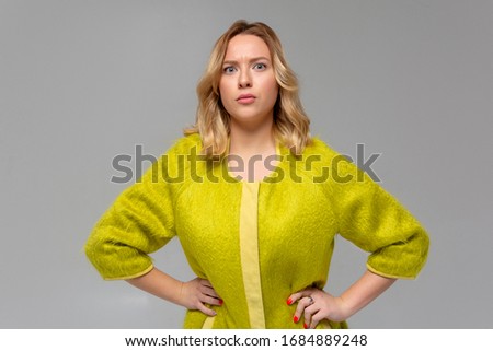 Portrait of displeased upset angry female, being discontent and unhappy as can t achieve goals, isolated over pink studio background. Dissapointed young woman has troubles. Fashion Lifestyle Beauty