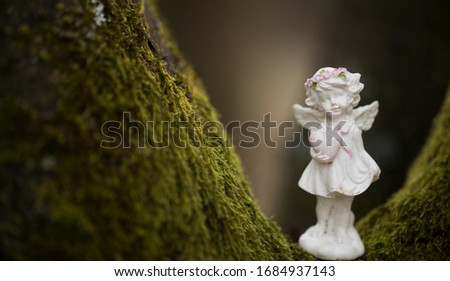 Angel statue nature background. Nature background. 