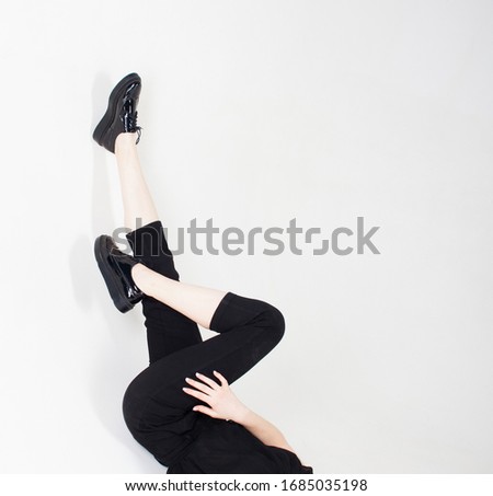 woman with long legs on white background