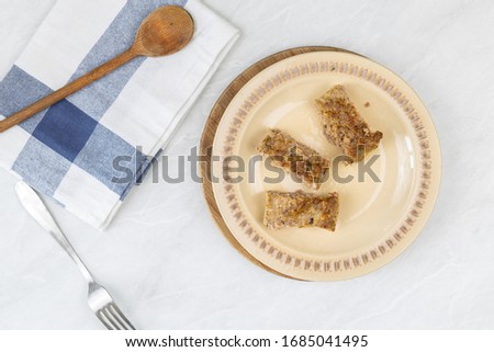 Minced meat meatloaf baked and served on the table
