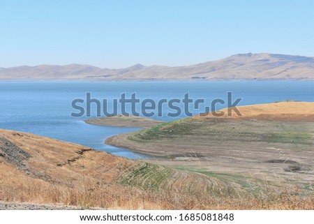 Desert with man made lake (Lake Isabella) in Kern County, California.