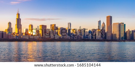 Chicago downtown skyline sunset Lake Michigan with most Iconic building from Adler Planetarium, Illinois, USA Royalty-Free Stock Photo #1685104144