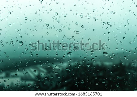 water drops on green gradient background 