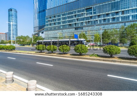 empty urban road with modern building in the city
