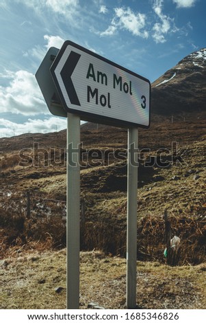 The Am Mol directional sign of a non-primary route on the Isle of Skye in Scotland, UK