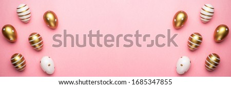 Easter eggs isolated on pink background. For greeting card, promotion, poster, flyer, web-banner, article.