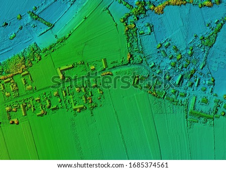 Digital elevation model. GIS product made after proccesing aerial pictures taken from a drone. Shows the urban area of the scattered village Royalty-Free Stock Photo #1685374561
