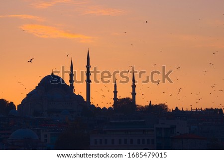 Hagia Sophia, in Istanbul, Turkey, silhouetted against the ochre sunset sky. This picture was taken off the property of Hagia Sophia, thus it doesn't require a property release.