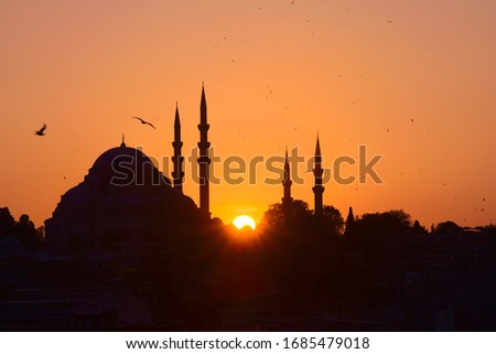 Hagia Sophia, in Istanbul, Turkey, silhouetted against the ochre sunset sky. This picture was taken off the property of Hagia Sophia, it doesn't require a property release.