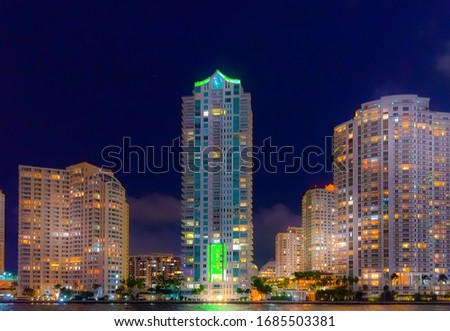 Skyscrapers in Miami Riverwalk at night. Florida, USA